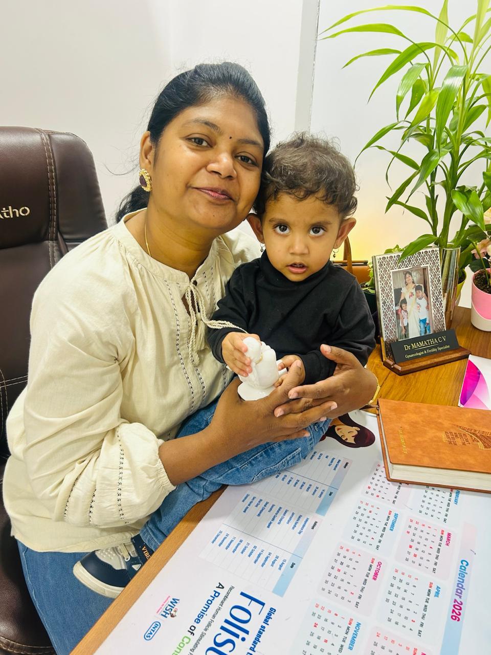 Dr. Mamtha C.V. with a child at her clinic